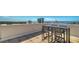 Enjoy stunning city and water views from this rooftop deck with its sleek bar-height table and chairs, perfect for sunsets at 505 S Orange Ave # 501, Sarasota, FL 34236