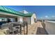 An open rooftop deck featuring dining and lounging areas, all with a view of the skyline at 505 S Orange Ave # 501, Sarasota, FL 34236