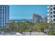 Scenic view of a bridge and luxury buildings, surrounded by lush greenery and a clear sky at 505 S Orange Ave # 501, Sarasota, FL 34236
