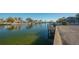 Private dock and boat access on a calm waterway at 526 67Th St, Holmes Beach, FL 34217