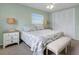 Cozy bedroom with a comfortable queen-size bed at 5303 Coral Blvd, Bradenton, FL 34210