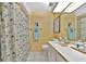 Clean bathroom with flamingo shower curtain and vanity at 535 Spring Lakes Blvd, Bradenton, FL 34210