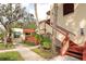 Condo building exterior showcasing walkway and landscaping at 535 Spring Lakes Blvd, Bradenton, FL 34210