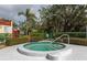 Community hot tub with surrounding landscaping at 535 Spring Lakes Blvd, Bradenton, FL 34210