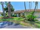 Charming single-story home with lush landscaping, mature trees, and a well-maintained lawn in a peaceful setting at 5376 Royal Palm Ave # 5376, Sarasota, FL 34234