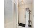 Bright foyer featuring white tile flooring, coat closet, overhead lighting and natural light at 5376 Royal Palm Ave # 5376, Sarasota, FL 34234