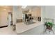 Kitchen with stainless steel sink, neutral countertops and cabinets, open to entryway at 5376 Royal Palm Ave # 5376, Sarasota, FL 34234