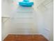 Large closet with wire shelving providing ample storage at 5807 Garden Lakes Fern # 5807, Bradenton, FL 34203