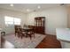 Spacious dining room with hardwood floors and a lovely window view at 5807 Garden Lakes Fern # 5807, Bradenton, FL 34203