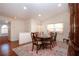 Formal dining room featuring hardwood floors and a decorative rug at 5807 Garden Lakes Fern # 5807, Bradenton, FL 34203