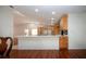 Modern kitchen boasts an expansive island and updated cabinetry at 5807 Garden Lakes Fern # 5807, Bradenton, FL 34203