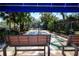 Community shuffleboard court with benches at 5807 Garden Lakes Fern # 5807, Bradenton, FL 34203