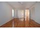 Bright bedroom with wood floors and sliding glass doors to exterior at 5807 Garden Lakes Fern # 5807, Bradenton, FL 34203