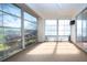 Screened porch with views of the backyard and surrounding landscape at 5807 Garden Lakes Fern # 5807, Bradenton, FL 34203