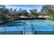 Two well-maintained tennis courts at 5807 Garden Lakes Fern # 5807, Bradenton, FL 34203
