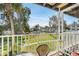 Balcony with view of community, lawn, and nearby buildings at 5903 Canal Dr # I24, Bradenton, FL 34207