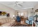 Inviting living room with neutral tones, ceiling fan, and comfortable seating arrangement at 5903 Canal Dr # I24, Bradenton, FL 34207