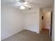 Bright bedroom with ceiling fan and large closet at 5904 17Th W St # C34, Bradenton, FL 34207