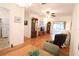 Bright living room with hardwood floors and access to a balcony at 5904 17Th W St # C34, Bradenton, FL 34207