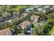 A high angle shot captures condos situated along a lush golf course and tranquil pond at 6706 Fairway Gardens Dr # 6706, Bradenton, FL 34203