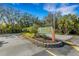 Well-maintained entrance to the community, featuring lush landscaping and clear signage at 6706 Fairway Gardens Dr # 6706, Bradenton, FL 34203