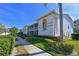 Exterior view of condo building with landscaping at 6908 Drewrys Blf # 712, Bradenton, FL 34203