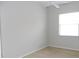 Cozy bedroom with ceiling fan and window with blinds at 7212 Southgate Ct, Sarasota, FL 34243