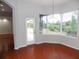 Bright breakfast nook with view of the backyard and access to patio at 7212 Southgate Ct, Sarasota, FL 34243