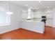 Kitchen with white cabinets, stainless steel appliances, and tile floor at 7212 Southgate Ct, Sarasota, FL 34243