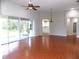Bright living room with tile floors and sliding glass doors at 7212 Southgate Ct, Sarasota, FL 34243
