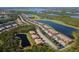 Aerial community view near golf course and water at 7315 River Hammock Dr # 206, Bradenton, FL 34212
