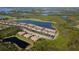 Aerial view of community near golf course and water at 7315 River Hammock Dr # 206, Bradenton, FL 34212