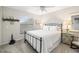 Charming bedroom with metal bed frame and decorative accents at 7315 River Hammock Dr # 206, Bradenton, FL 34212