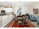 Elegant dining area with a rustic table and bench seating at 7315 River Hammock Dr # 206, Bradenton, FL 34212