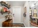 Bright entryway with rustic decor and view into the living area at 7315 River Hammock Dr # 206, Bradenton, FL 34212