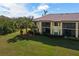 Building exterior with a brown tile roof at 7315 River Hammock Dr # 206, Bradenton, FL 34212
