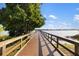 Enjoy stunning lake views from this peaceful wooden pier at 7315 River Hammock Dr # 206, Bradenton, FL 34212