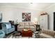 Relaxing living room features a neutral color palette and cozy furniture at 7315 River Hammock Dr # 206, Bradenton, FL 34212
