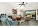 Spacious living room boasts ample natural light and comfortable seating at 7315 River Hammock Dr # 206, Bradenton, FL 34212