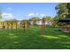 playground with swings and play equipment at 7315 River Hammock Dr # 206, Bradenton, FL 34212