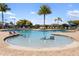 Relaxing resort-style pool with a zero-entry feature at 7315 River Hammock Dr # 206, Bradenton, FL 34212