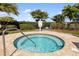 Community spa with a circular design at 7315 River Hammock Dr # 206, Bradenton, FL 34212