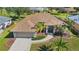 House with pool and landscaped yard, aerial view at 7518 Paspalum, Punta Gorda, FL 33955