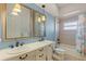 Bathroom with double vanity and large mirrors at 7518 Paspalum, Punta Gorda, FL 33955