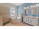 Bathroom with double vanity, corner soaking tub at 7518 Paspalum, Punta Gorda, FL 33955