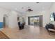 Living room with pool view and tile floors at 7518 Paspalum, Punta Gorda, FL 33955