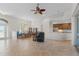 Spacious living room with tile floors and kitchen view at 7518 Paspalum, Punta Gorda, FL 33955