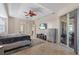 Main bedroom with king-size bed, large TV and pool view at 7518 Paspalum, Punta Gorda, FL 33955