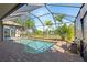 Screened pool with brick patio and view at 7518 Paspalum, Punta Gorda, FL 33955