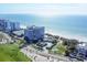 Coastal condominiums with stunning ocean views, complemented by lush landscaping and beachfront lifestyle at 775 Longboat Club Rd # 902, Longboat Key, FL 34228